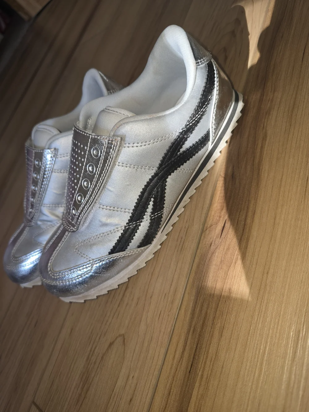 Silver Metallic Slip-On Girls Sneakers with Black Accent